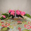 Vibrant Pink Artificial Flower Arrangement in Woven Basket Centerpiece